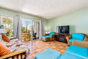 Departamento, 1 habitación | Área de sala de estar | Televisión 