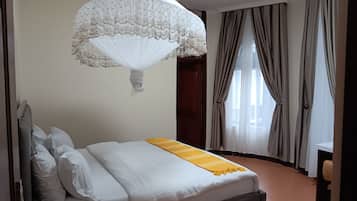 Executive Single Room | Blackout drapes, iron/ironing board, free WiFi