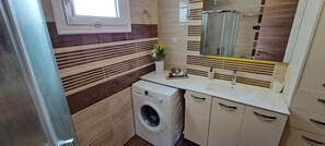 Hair dryer, towels, soap, shampoo