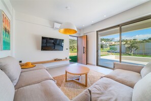 Exclusive Villa, 2 Bedrooms, Private Pool | Living room | 55-inch Smart TV with satellite channels, Netflix, streaming services