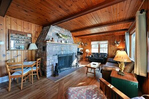Fireplace - The Cabin- cozy cottage on the sandy shores of the Chippewa Flowage (Hayward)