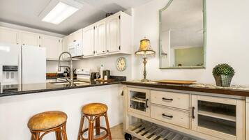 Condo, 1 King Bed (Kona Alii 208) | Private kitchen | Paper towels