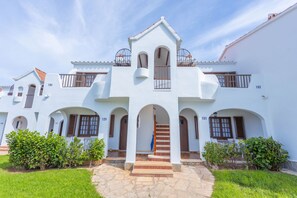 Traditional architecture meets serene surroundings in this elegant building.