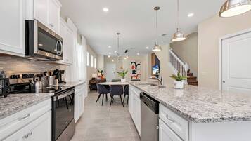 Microwave, dishwasher, highchair, paper towels