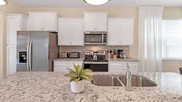 Microwave, dishwasher, highchair, paper towels