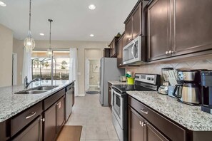 Fridge, microwave, oven, stovetop - 5BD Windsor Westside Near Parks (WW 8957) (Kissimmee)