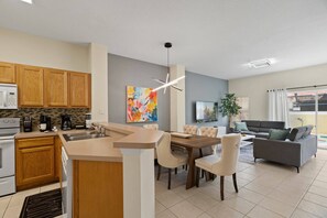 Microwave, dishwasher, high chair, paper towels