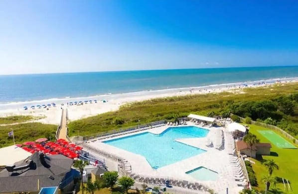 A resort with a large pool, beach access, and a view of the ocean. - TWO Minute Walk to the Beach-Family Friendly Oceanside Resort-King Bed (Hilton Head Island)