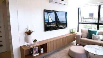 Deluxe Apartment, Pool Access, Beach View | Living area