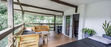 A generous wraparound balcony to fully enjoy the natural surroundings.