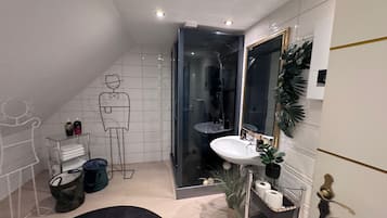 Shower, hair dryer, towels, soap
