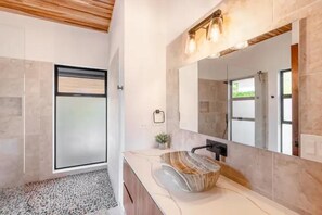 Shower, hair dryer, towels, soap