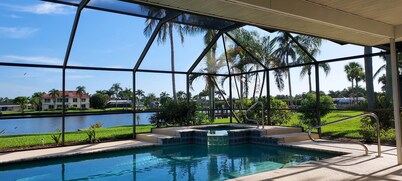 Serene Vacation Home on Water with Luxurious Pool. 