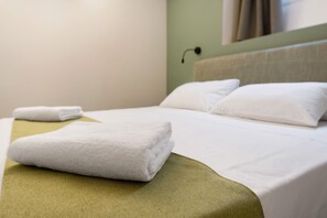 1 habitación, tabla de planchar con plancha, wifi gratis y ropa de cama 