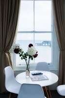 Deluxe Suite, Sea View | Pillow-top beds, desk, laptop workspace, blackout curtains