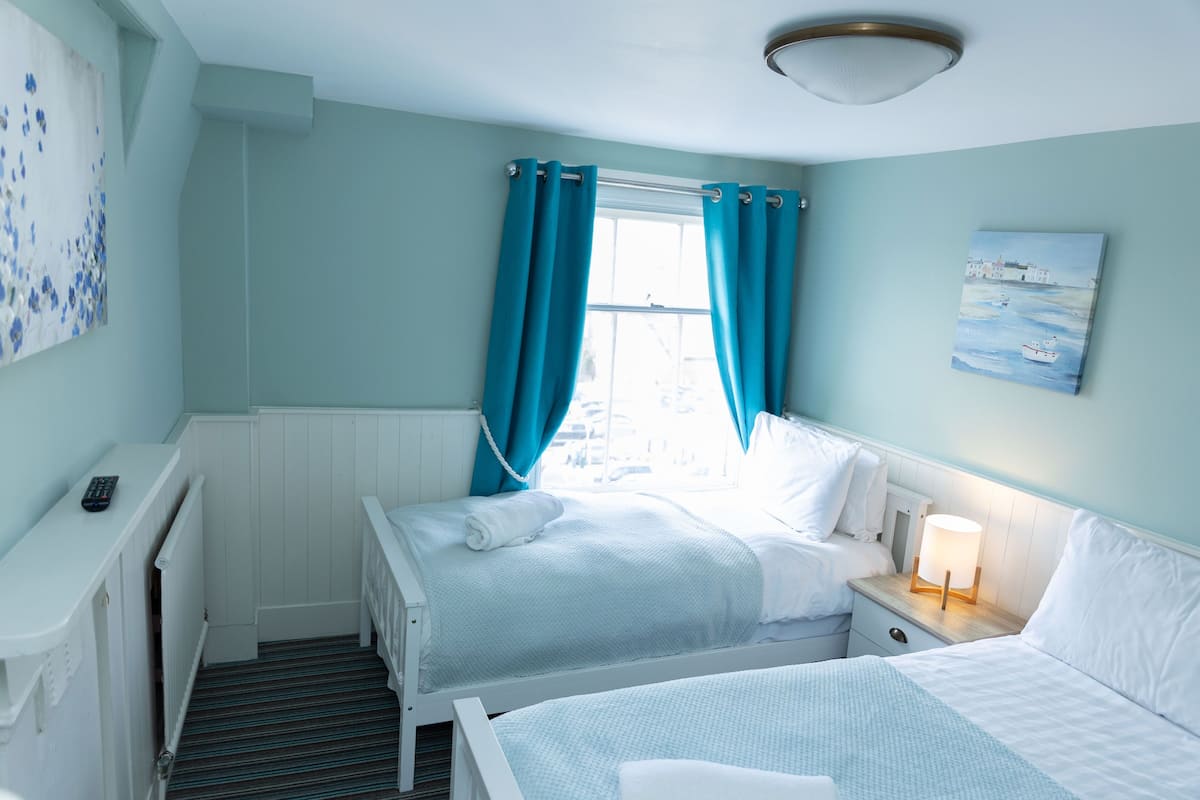 Deluxe Suite, 2 Bedrooms, Sea View | 1 bedroom, pillowtop beds, individually decorated