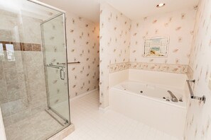 Shower, jetted tub, towels