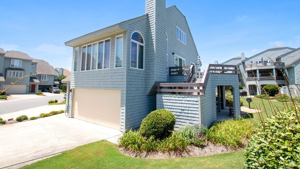 A modern two-story house with a garage, a large window, and a small porch. - Oceanside, Community Pools, Community Tennis, 628,  Corolla Time (Corolla)