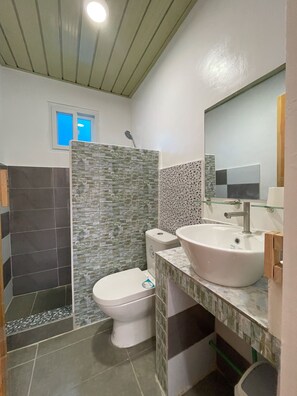 A bathroom with a toilet, a shower, and a sink. - B Boutique Hotel Cebu powered by Cocotel (Lapu-Lapu)