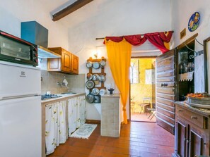 Fridge, microwave, cookware/dishes/utensils