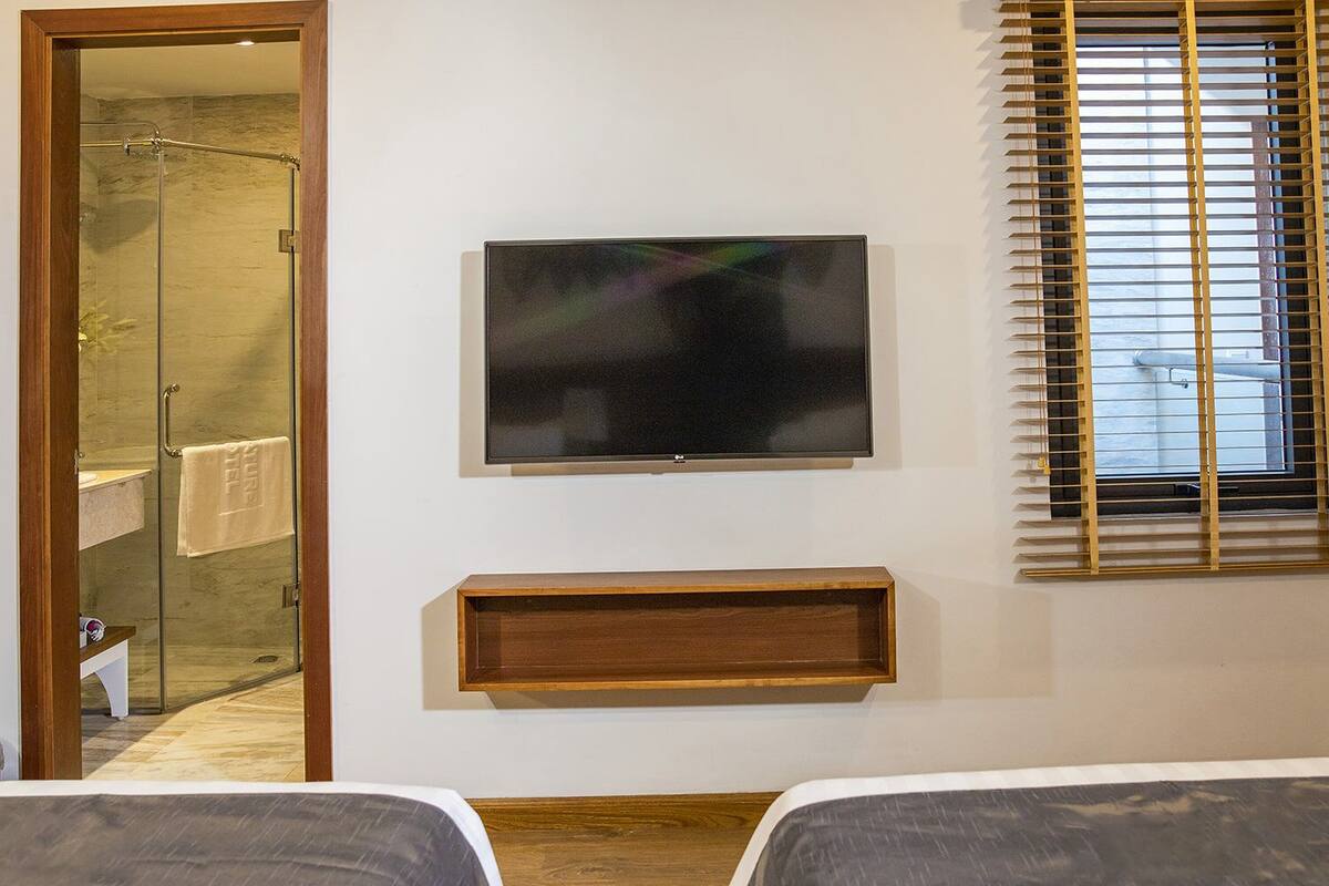 Habitación Deluxe con 2 camas individuales | Ropa de cama hipoalergénica, edredón y artículos del minibar gratis