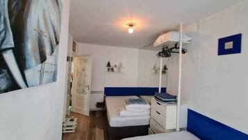 1 Schlafzimmer, BĂŒgeleisen/BĂŒgelbrett, WLAN, BettwĂ€sche