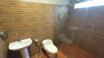 Villa familiar | Baño | Regadera y toallas