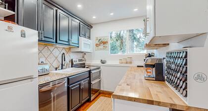 Centrally located condo with office, fireplace, W/D, & ski closet