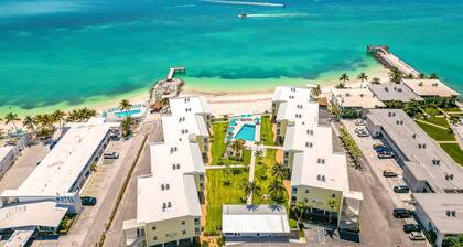 Oceanfront condo with open layout, balcony, amazing views, & outdoor pool