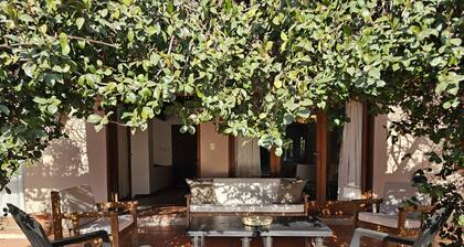 Espaciosa y cálida en medio de gran parque