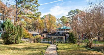 Lakefront Getaway with Private Dock, Swim Deck, BBQ and Mother-In-Law Suite – Perfect for Families!