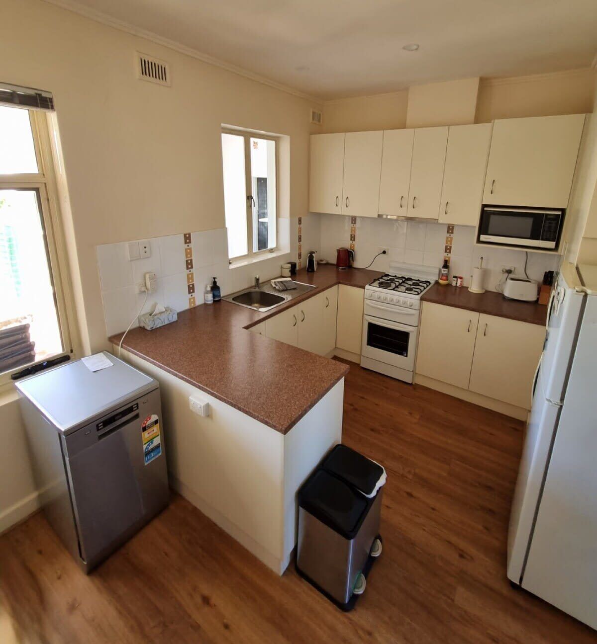 Fridge, electric kettle, toaster, cookware/dishes/utensils