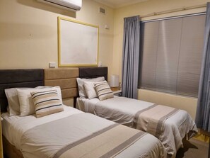 3 quartos, ferros/tábuas de passar roupa, berço de viagem, Wi-Fi