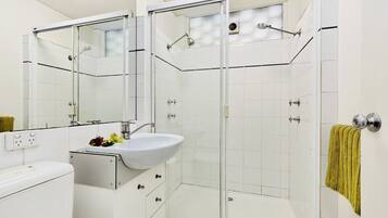 Shower, hair dryer, towels, soap