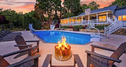 Lakefront Home + Saltwater Pool + Slide | Private Dock, Fire Pit | Sip, Sip Away