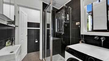Shower, hair dryer, towels, soap