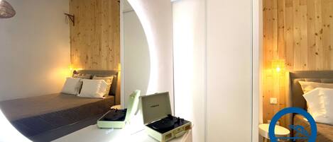 2 habitaciones, tabla de planchar con plancha, wifi y ropa de cama