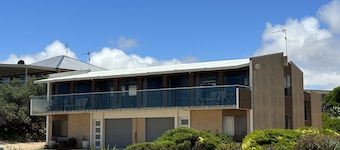Absolute Beachfront on the cliff with easy stair access to the beach (BYO LINEN)
