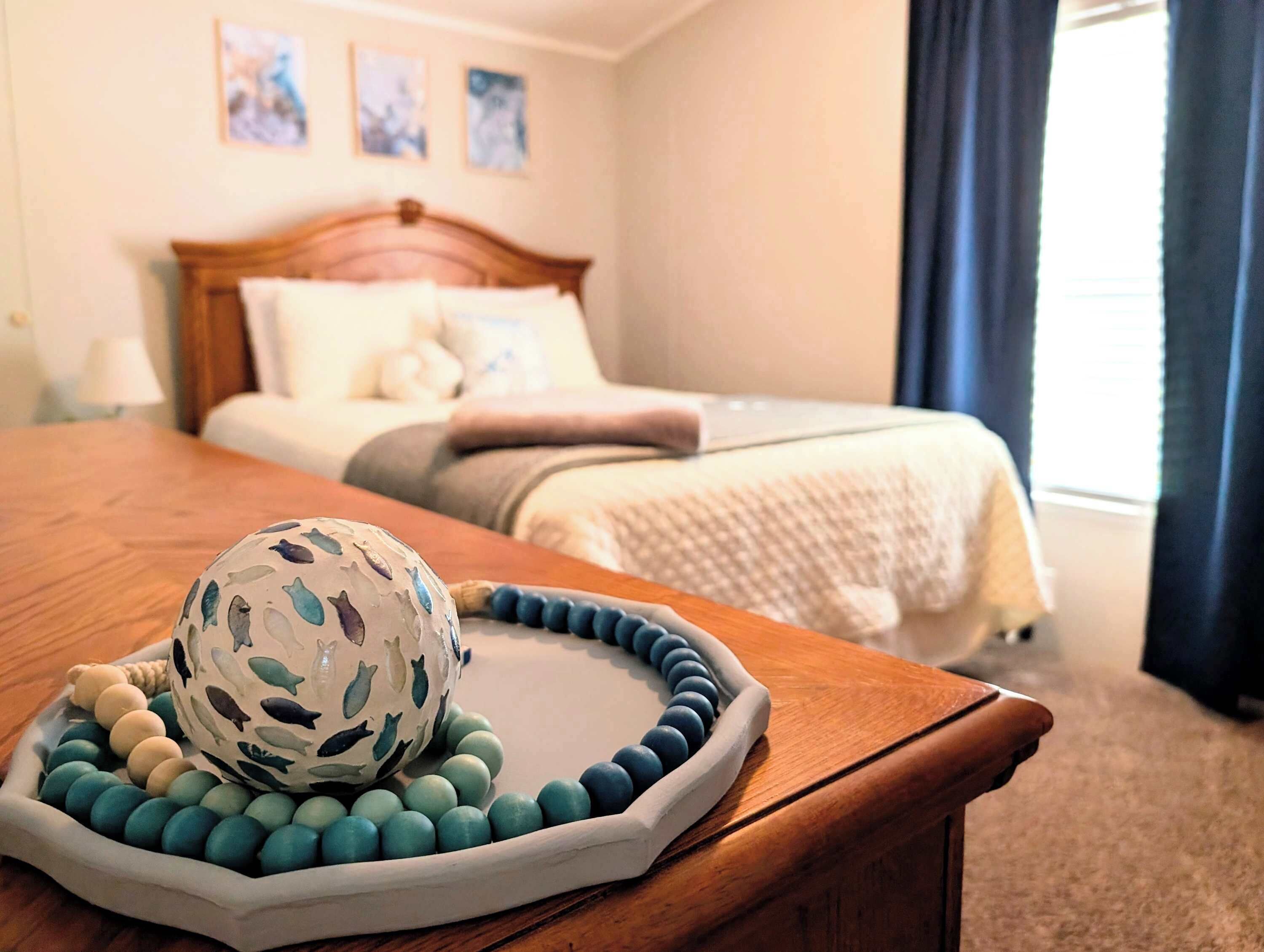 Bedroom 2: The room features convenient storage and soft carpeting underfoot.
