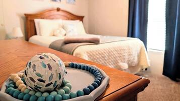 Bedroom 2: The room features convenient storage and soft carpeting underfoot.