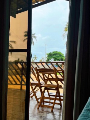 Quarto casal exclusivo, varanda coberta, vista para o resort | Roupas de cama premium, frigobar, individualmente decorados