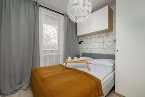 1 habitación, tabla de planchar con plancha, wifi y ropa de cama 