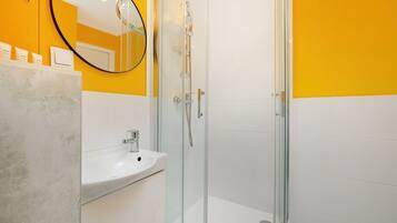 Shower, hair dryer, shampoo