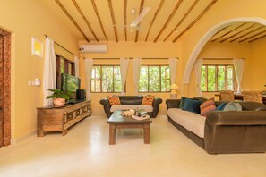 Vila conforto | Área de estar | TV de tela plana