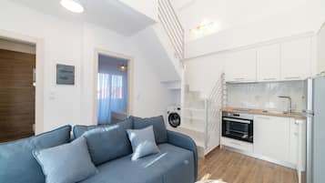 Loft | Cocina privada | Refrigerador con congelador, horno y parrilla de estufa