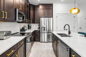 Fridge, microwave, oven, stovetop - Villa Nova | Vacay home of your dreams w pool, grand BRs, next to Universal (Orlando)