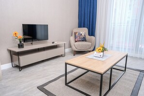 70-cm LED TV with satellite channels, heated floors, streaming services