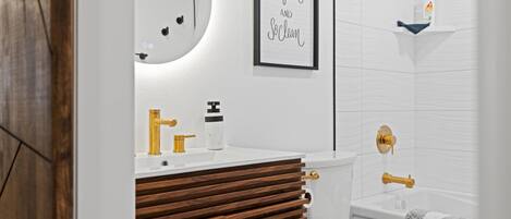 Shower, towels, soap, toilet paper