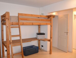 1 bedroom, desk, iron/ironing board, travel crib