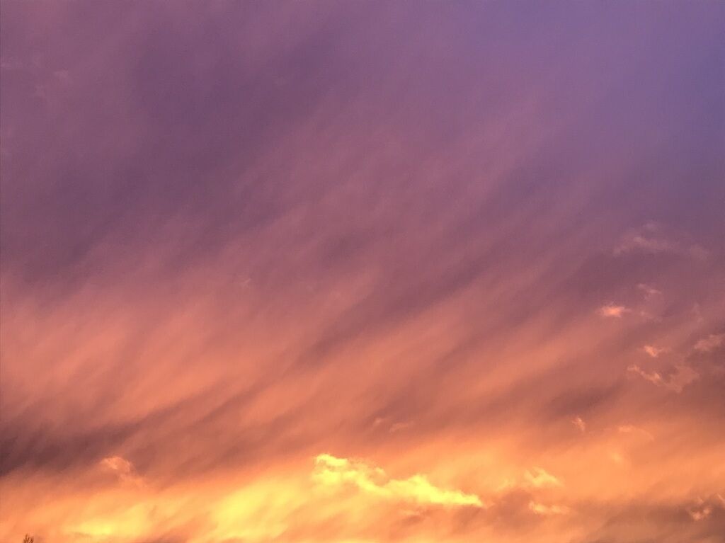 A sunset sky with clouds.